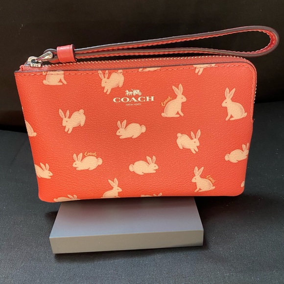Coach Handbags - Coach wristlet BUNNY